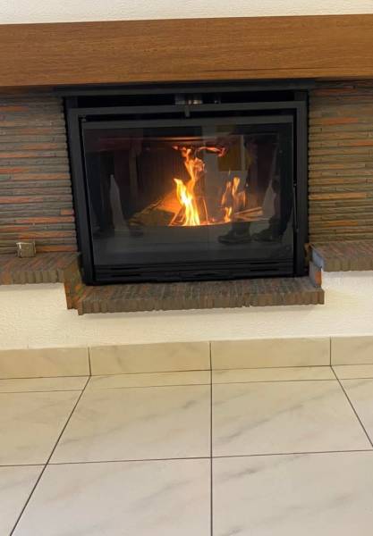 Pose d'un Appareil a Bois Godin Insert Modane 75V pour une Maison individuelle